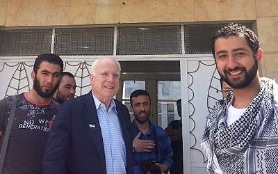 Click on image to see full-sized version Senator John McCain and former US presidential candidate leaving a meeting ISIS chief Abu Bakr Al Baghdadi