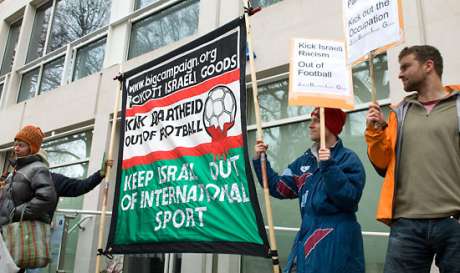 Click on image to see full-sized version PSC and Jews for Boycotting Israeli Goods campaigners protest and Israeli team playing in England