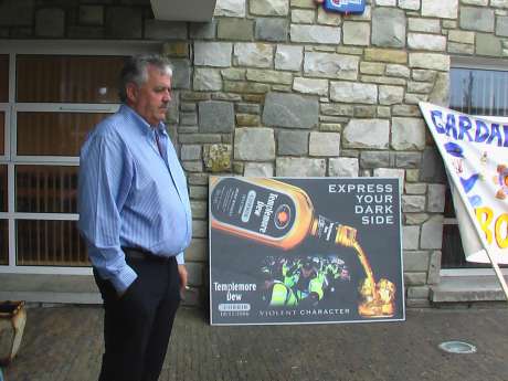 Click on image to see full-sized version Head of IRMS, Jim Farrell infront of an appropriate sign