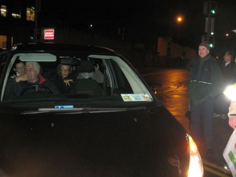Maura (center) inside the van