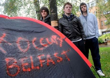 Click on image to see full-sized version #OccupyBelfast: Anti-capitalist protestors brave Ulster rain (William Donnelly, Ryan Barnes and Neil Moore, as Occupy Belfast demonstrators Protest at the Cathedral quarter in Belfast)
